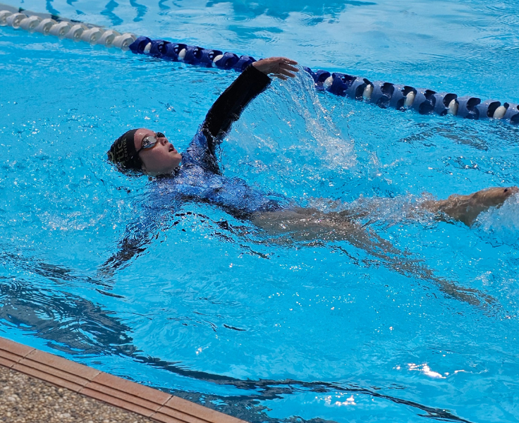 Photo of student swimming backstroke at our school swimming carnival.