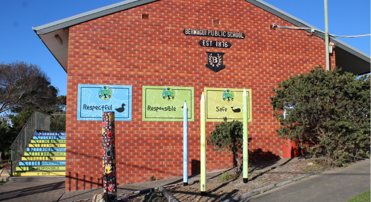 Photo of entrance of our school, featuring our garden and signs with our expectations, Respectful, responsible and safe.